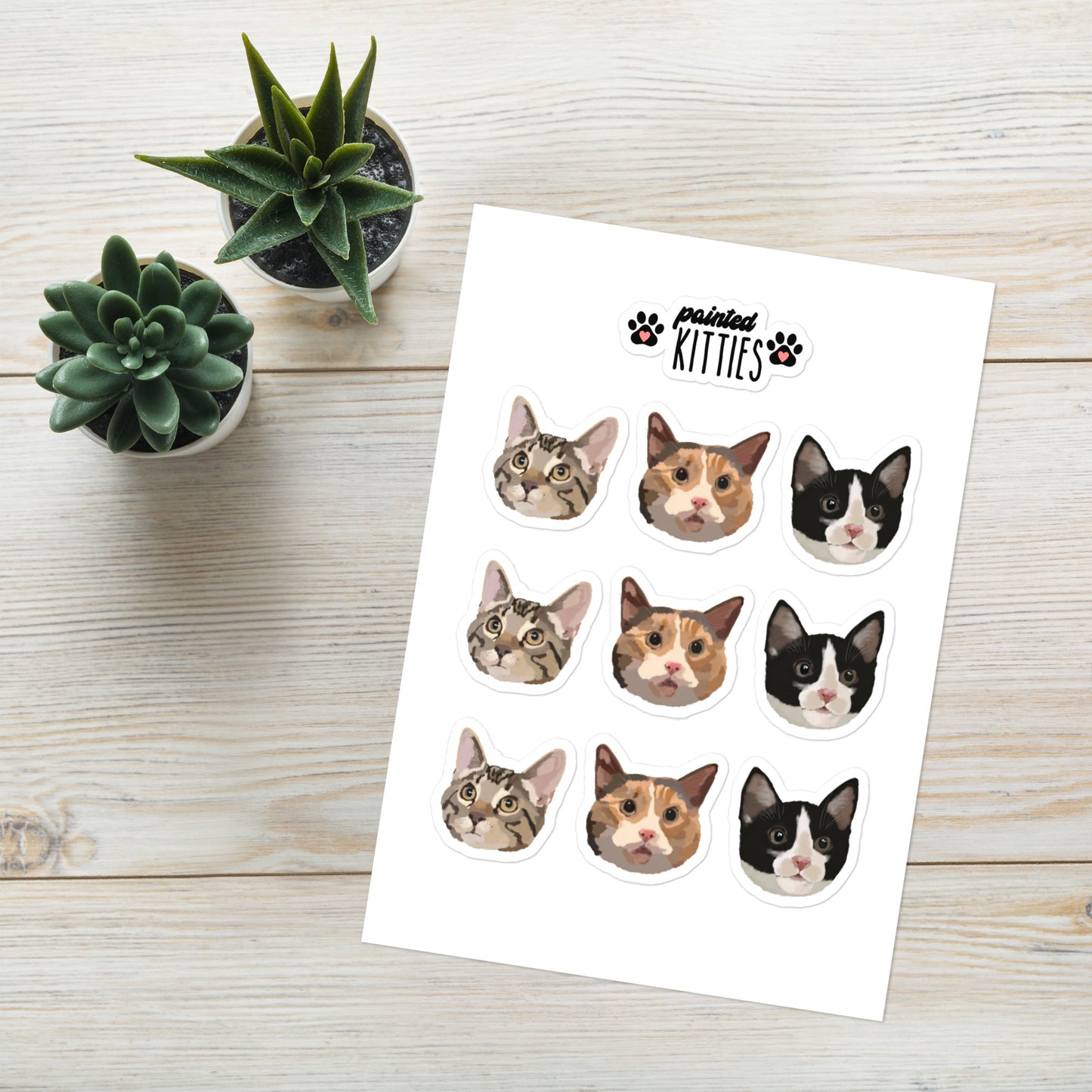 A sheet of 9 Kitty face stickers, cat face stickers, calico, tabby and tuxedo cats